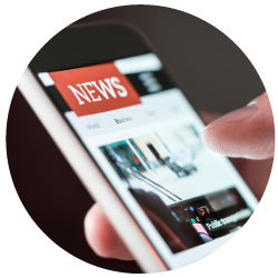 Person scrolling through travel news on their mobile phone
